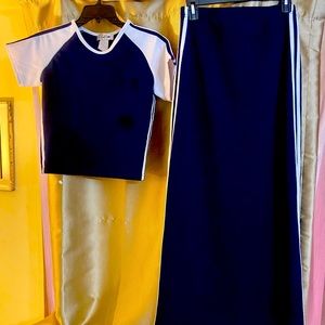 Top Size Medium. Skirt Size Small. Polyester. Spandex Fit.